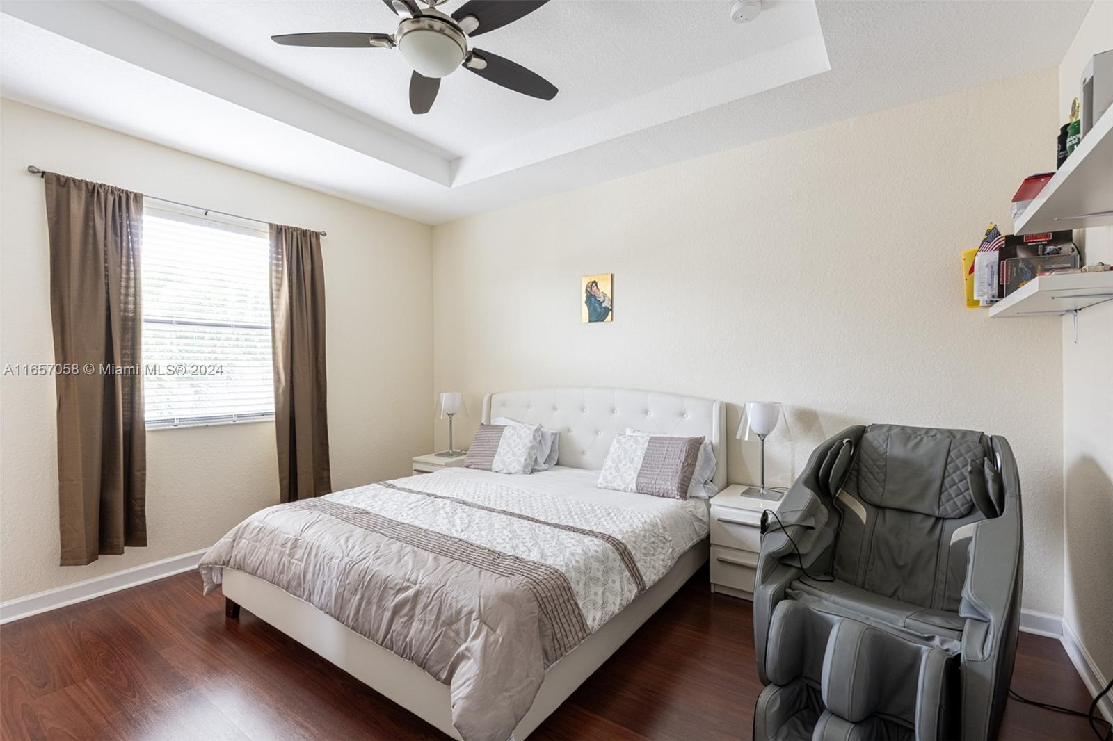 23578 Southwest 113th Path Homestead, FL 33032 - Photo 21 of 59 a bedroom with a bed and window