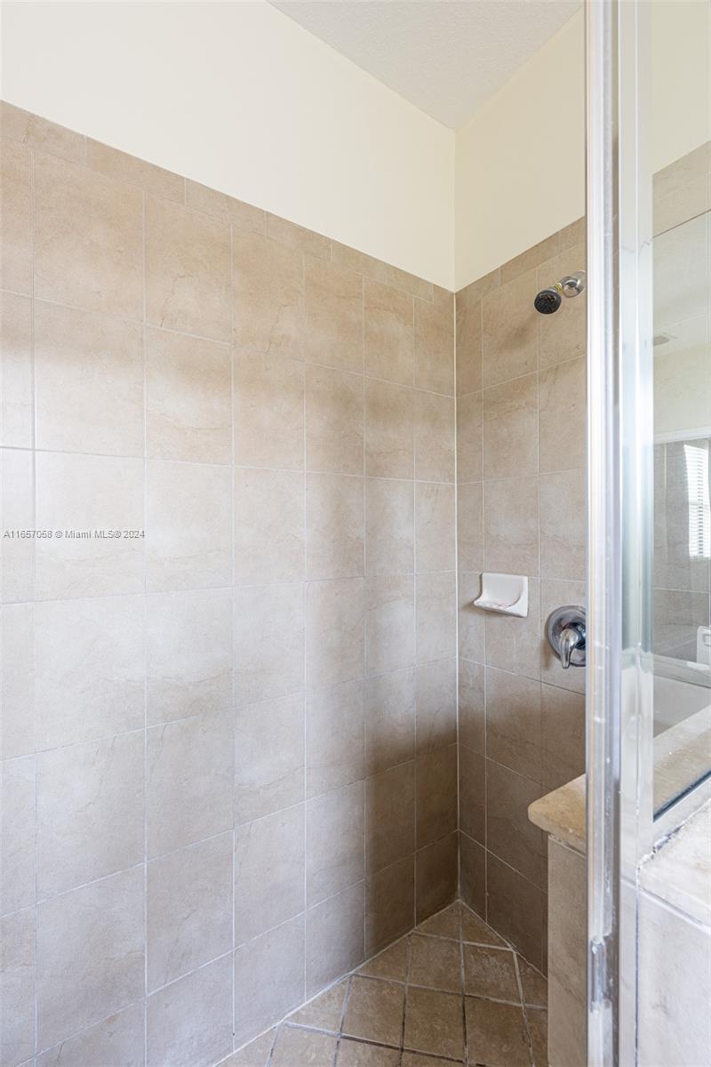 23578 Southwest 113th Path Homestead, FL 33032 - Photo 29 of 59 a bathroom with a shower