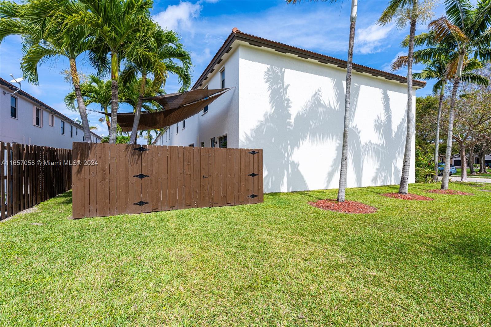 23578 Southwest 113th Path Homestead, FL 33032 - Photo 41 of 59 a view of backyard with a barn and a large cactus tree