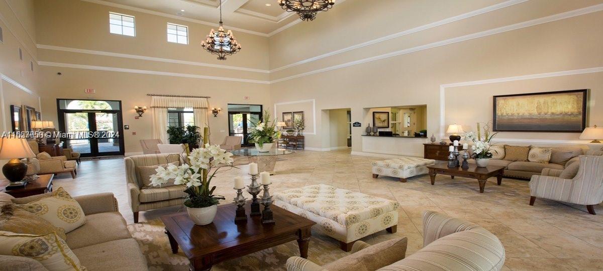 23578 Southwest 113th Path Homestead, FL 33032 - Photo 53 of 59 a living room with furniture and a flat screen tv