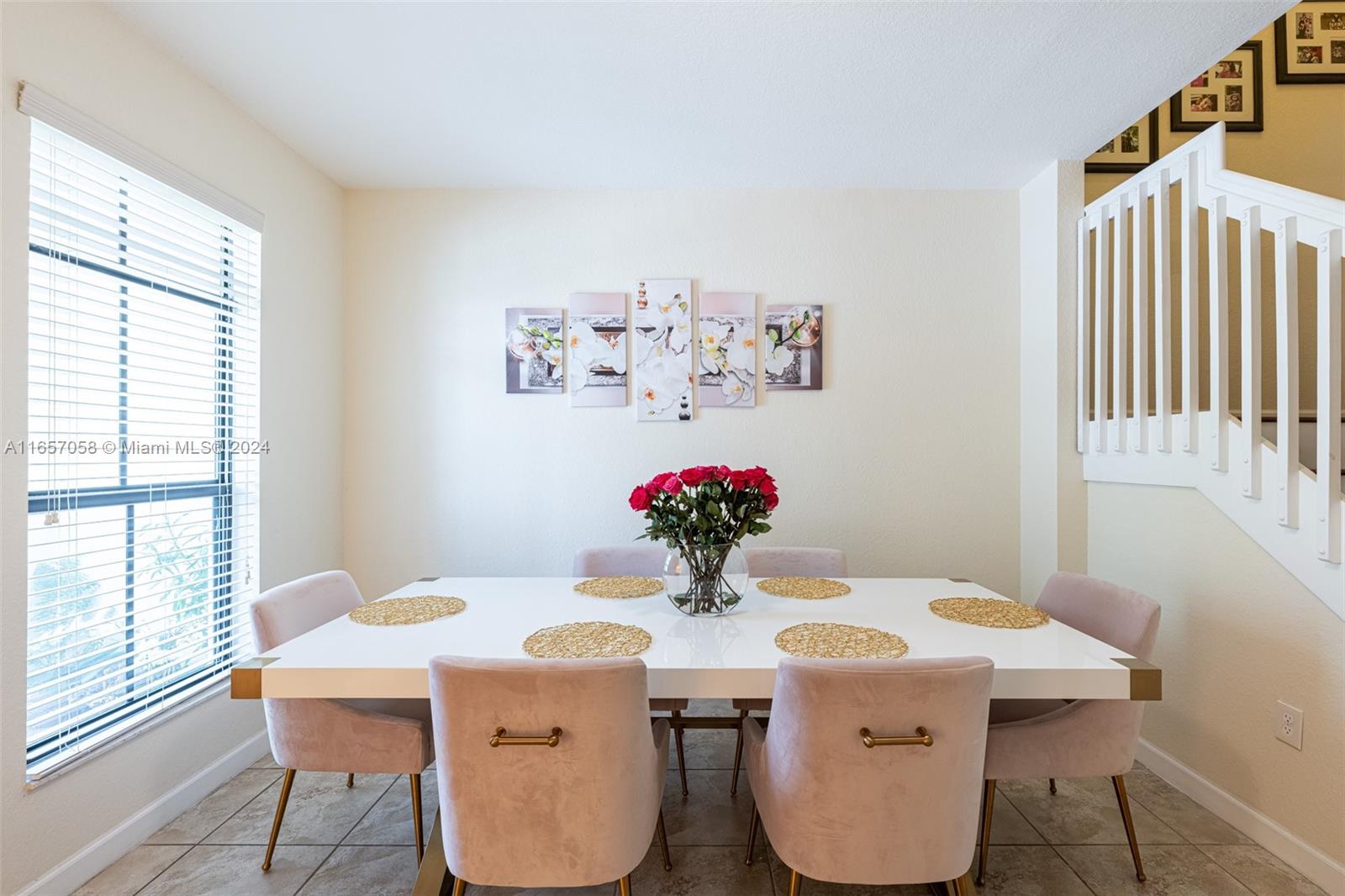 23578 Southwest 113th Path Homestead, FL 33032 - Photo 8 of 59 a dining room with a table and chairs