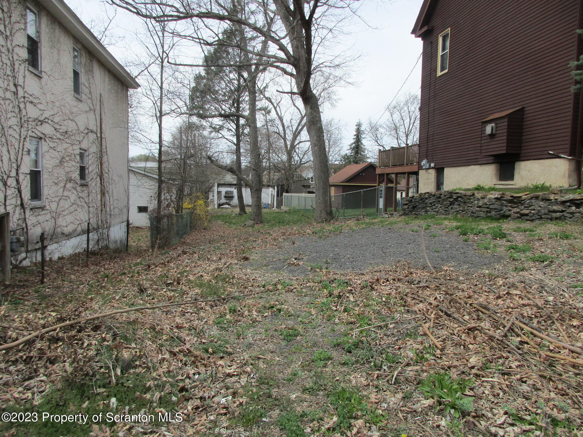 717 Harrison Avenue Scranton, PA 18510 - Photo 2 of 2 a backyard of a house with lots of green space
