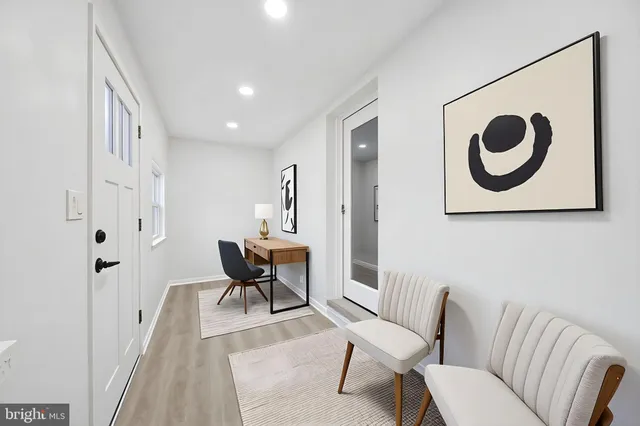 a view of a livingroom with furniture and a couch