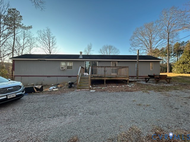 10209 Colemans Lake Road Ford, VA 23850 - Photo 3 of 6 Manufactured / mobile home featuring a deck