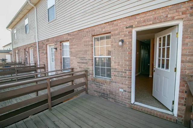 a view of a house with a large window