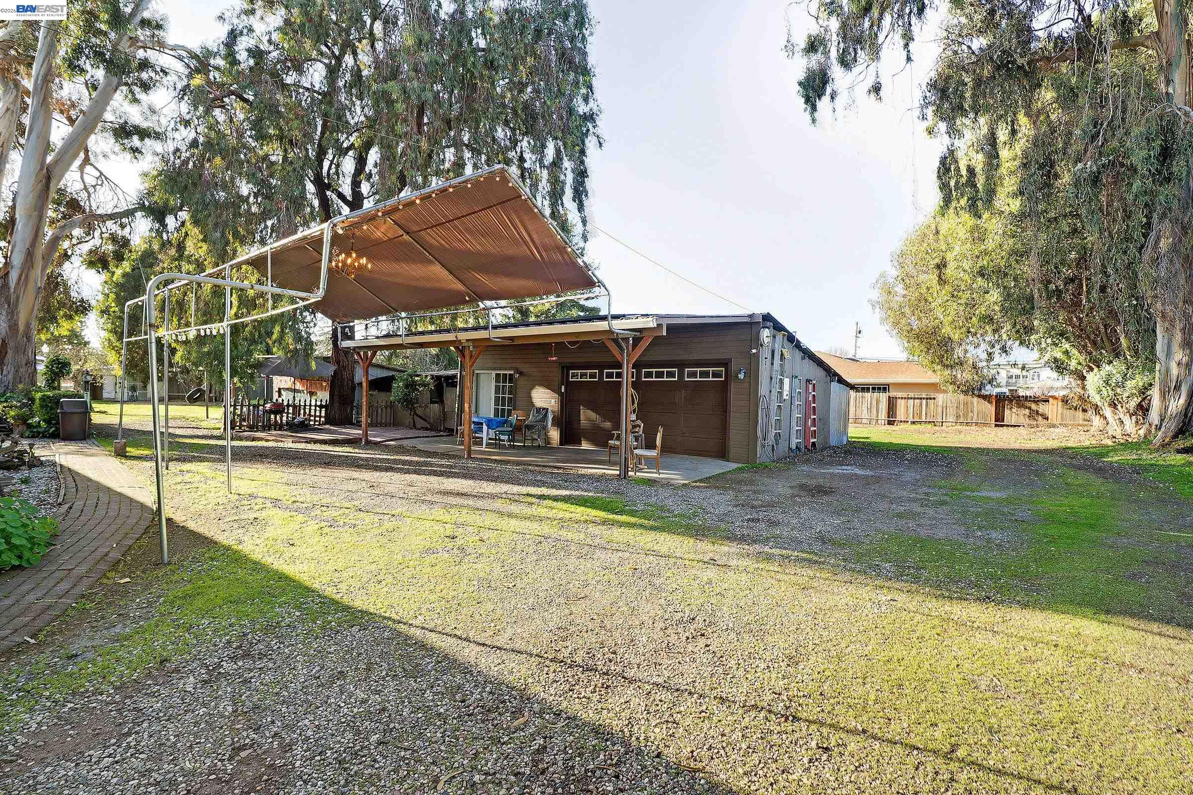 1177 Thiel Road Hayward, CA 94544 - Photo 31 of 55 a view of a house with pool and sitting area
