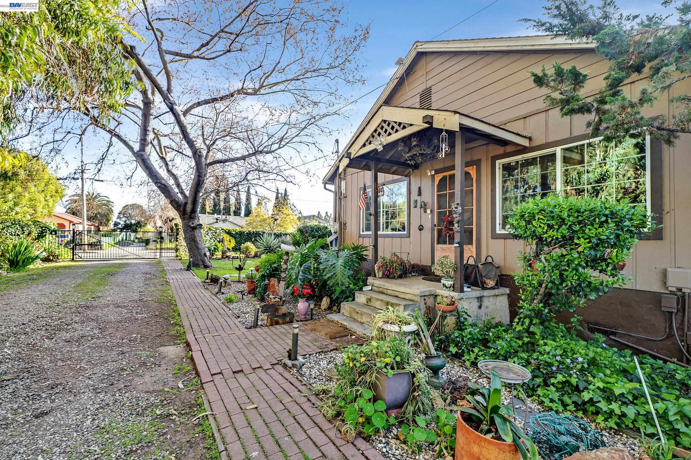 1177 Thiel Road Hayward, CA 94544 - Photo 40 of 55 a front view of a house with a yard