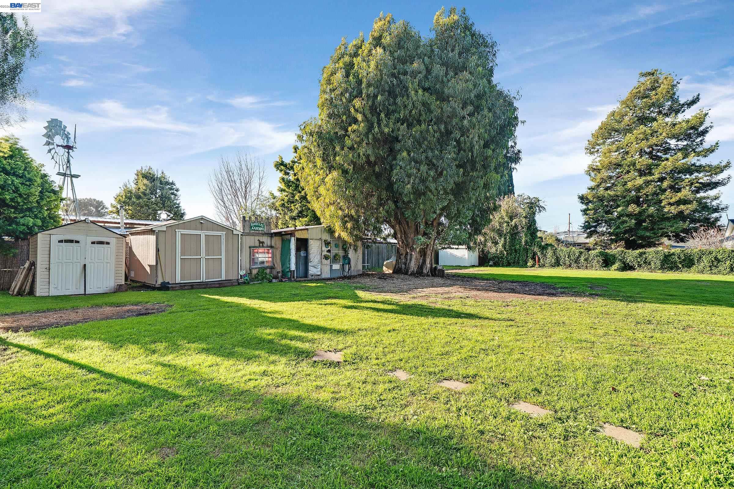 1177 Thiel Road Hayward, CA 94544 - Photo 45 of 55 a view of a house with a yard