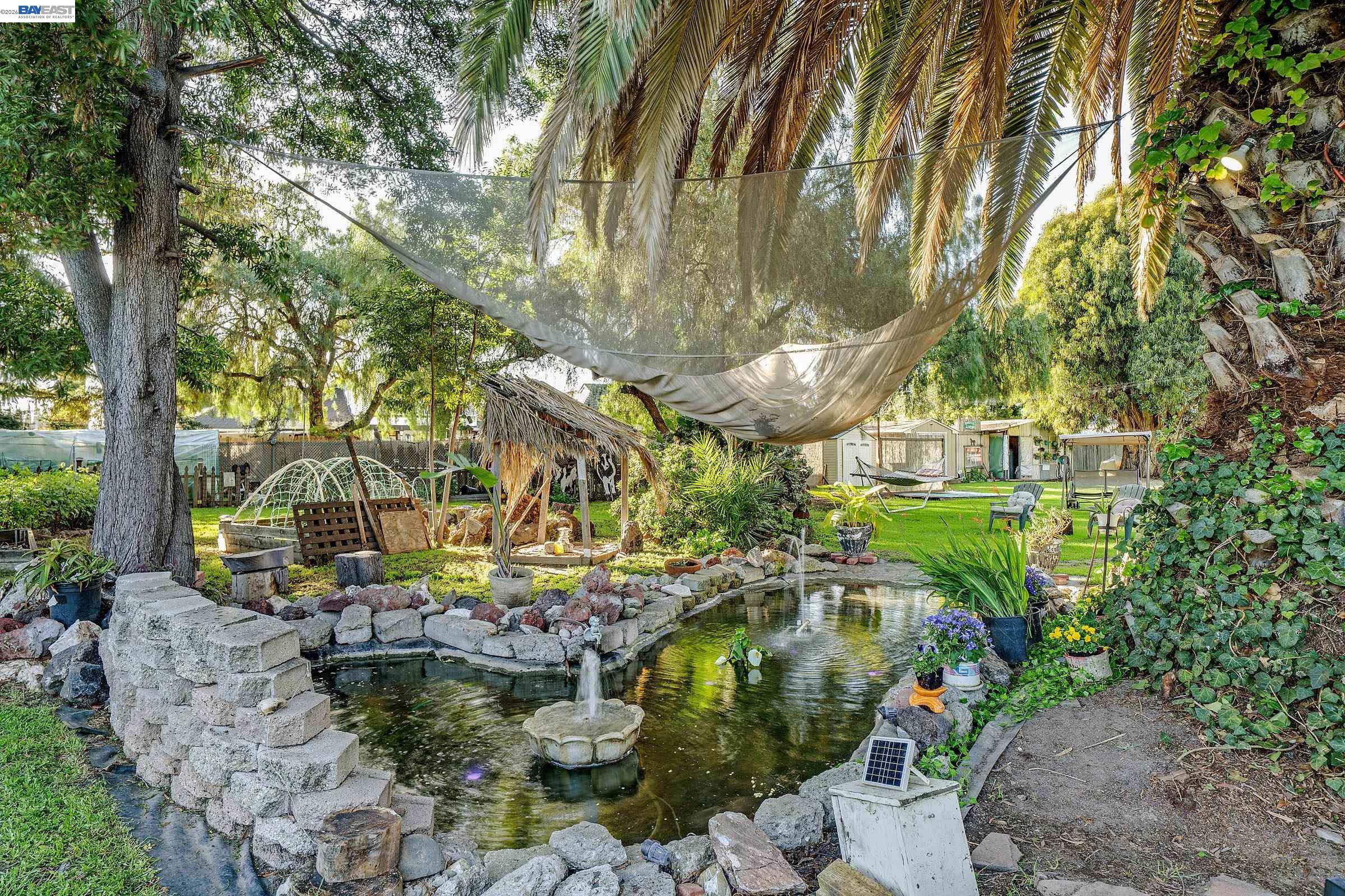 1177 Thiel Road Hayward, CA 94544 - Photo 50 of 55 a view of yard with tree and outdoor seating