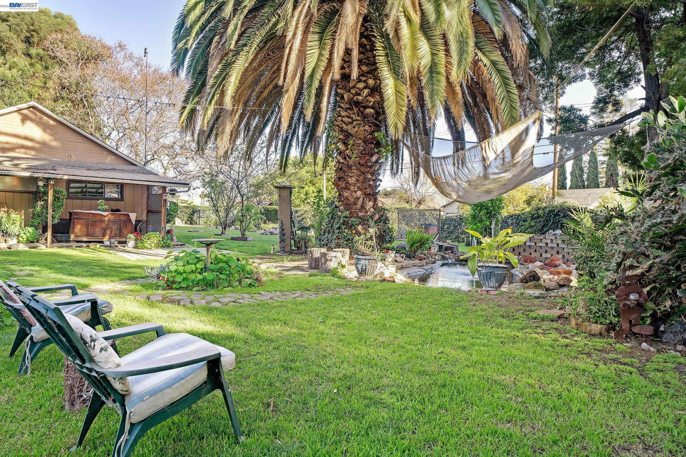 1177 Thiel Road Hayward, CA 94544 - Photo 5 of 55 a view of yard with seating area and trees