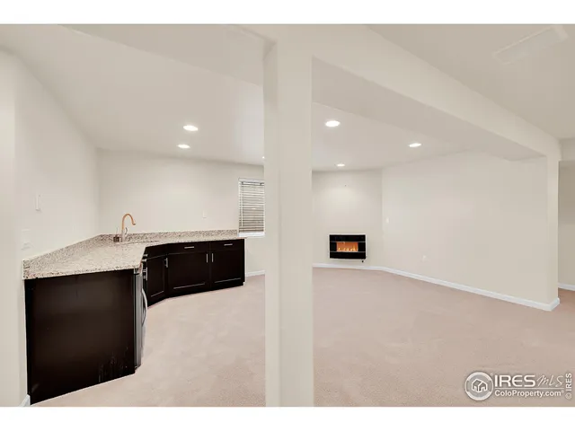 a kitchen with a wooden cabinet