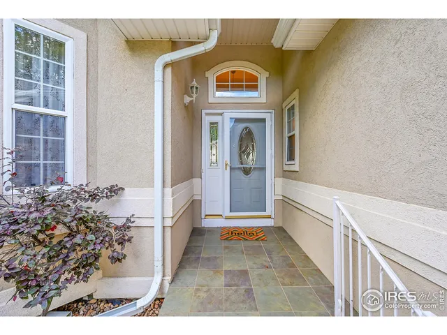 a view of entryway with a front door