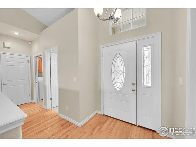 a view of entryway with wooden floor