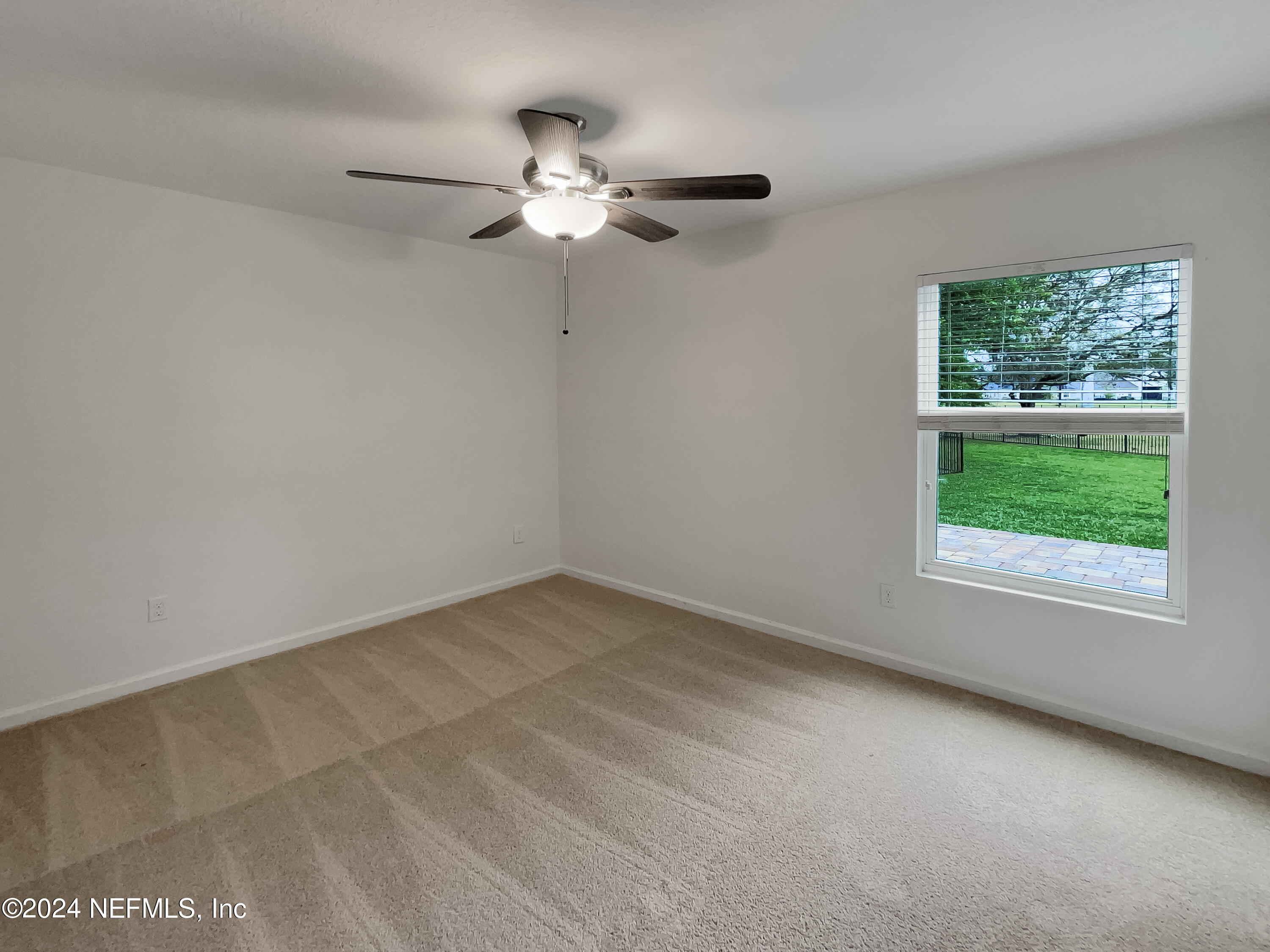204 Providence Drive St. Augustine, FL 32092 - Photo 17 of 20 a view of an empty room with a window