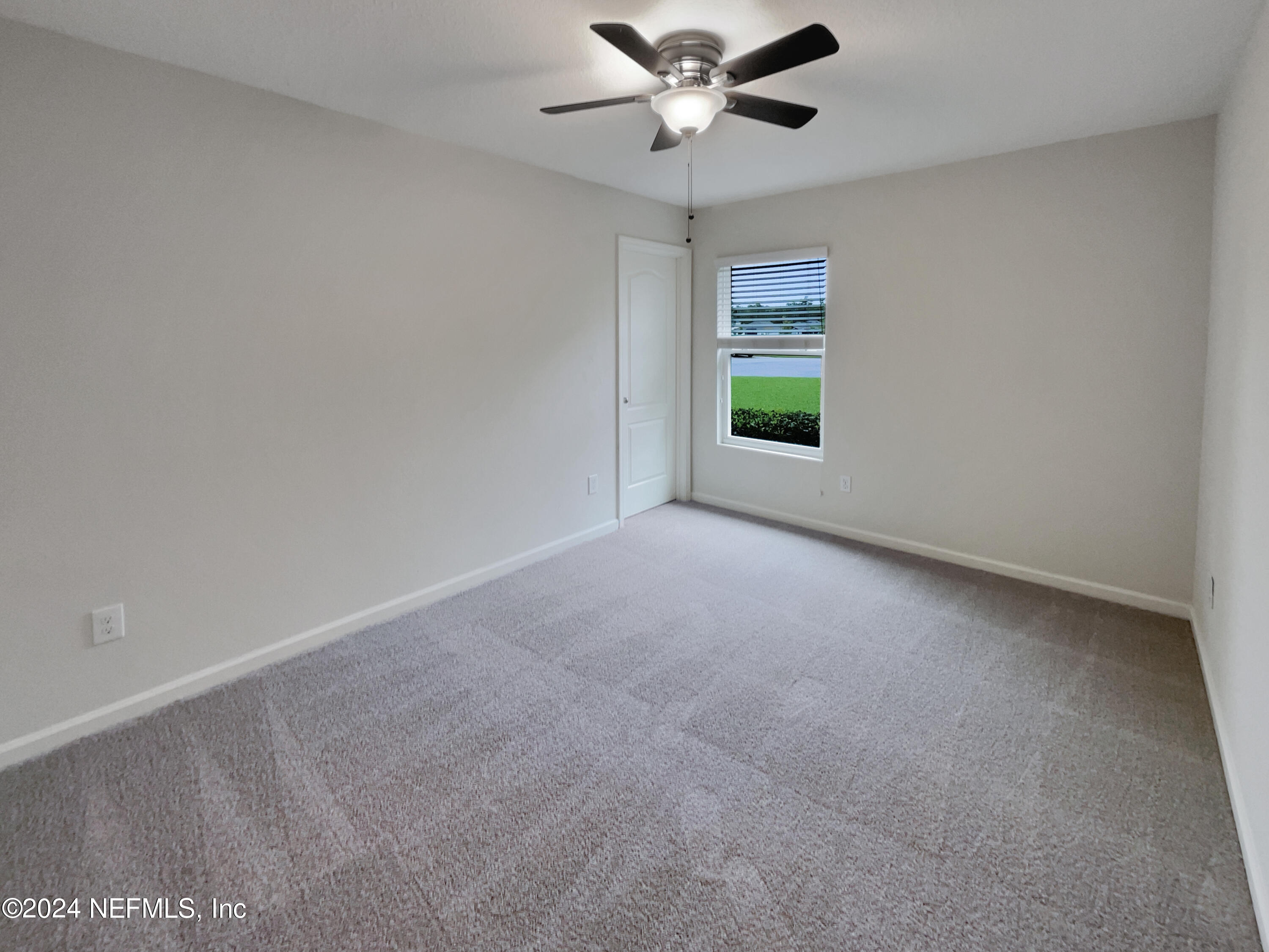 204 Providence Drive St. Augustine, FL 32092 - Photo 5 of 20 a view of room with window and ceiling fan