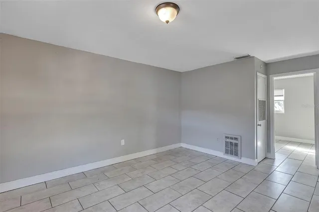 a view of a livingroom with wooden floor