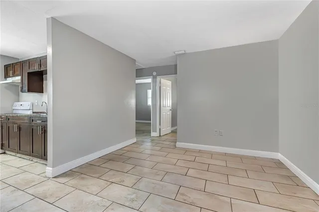 a view of an empty room with a sink