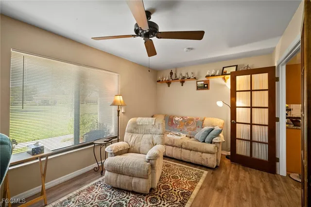 a living room with furniture and a window