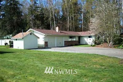 9007 Valley View Road Custer, WA 98240 - Photo 1 of 1 a front view of a house with a yard and trees