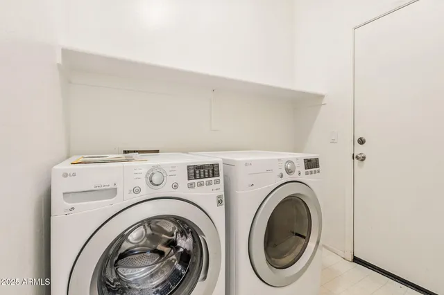 a view of room with window and wooden floor