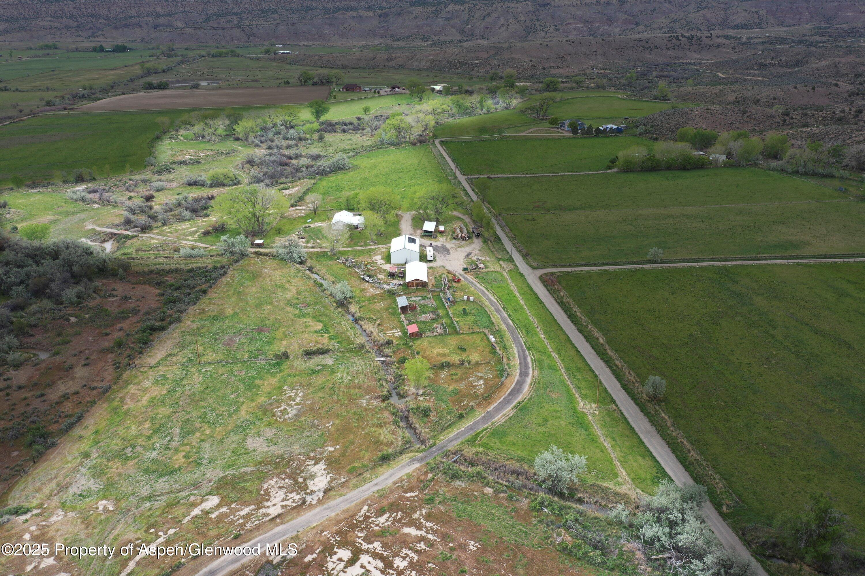 70 Frontage Road De Beque, CO 81630 - Photo 2 of 26 a view of a garden