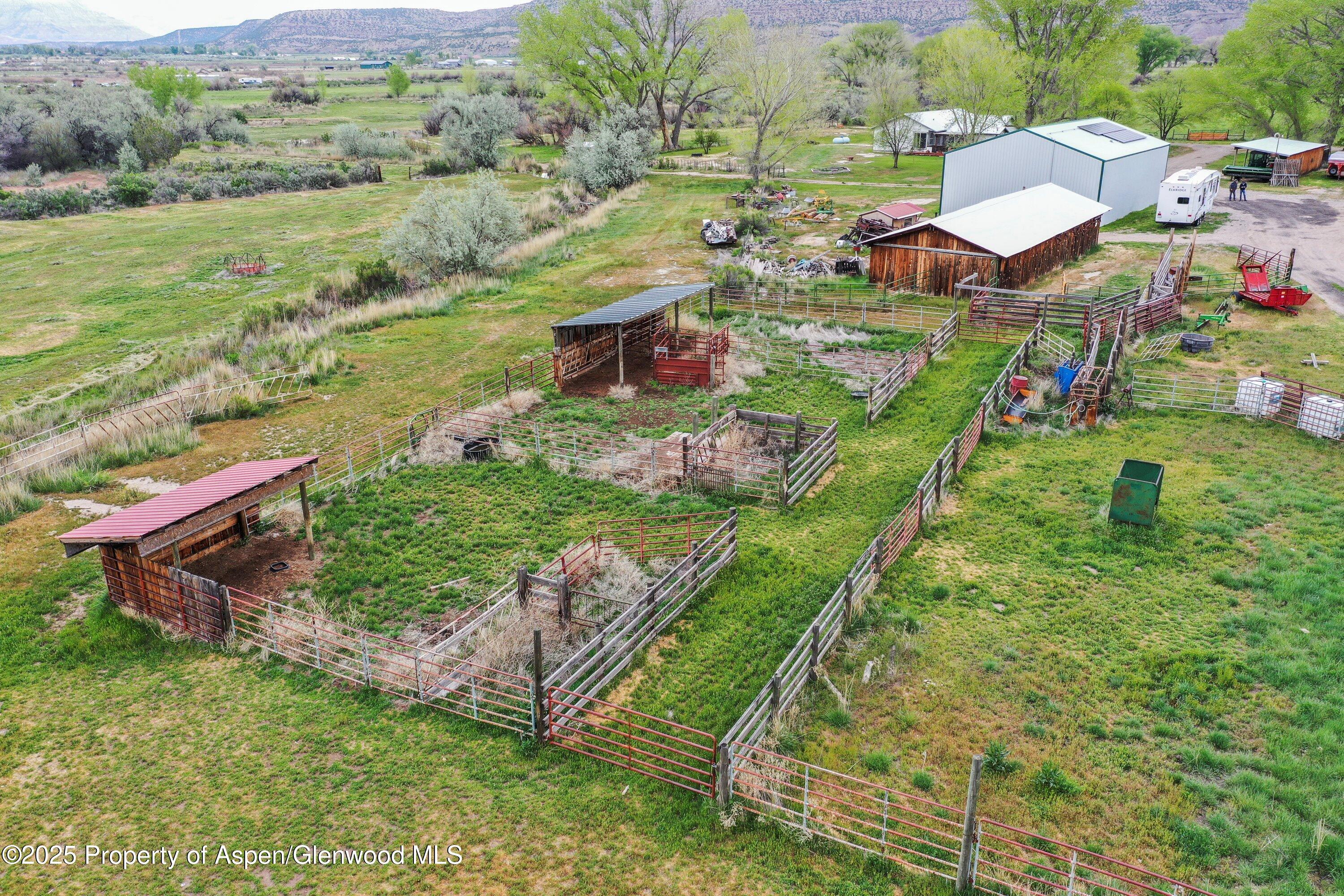 70 Frontage Road De Beque, CO 81630 - Photo 6 of 26 a view of a garden with an outdoor seating
