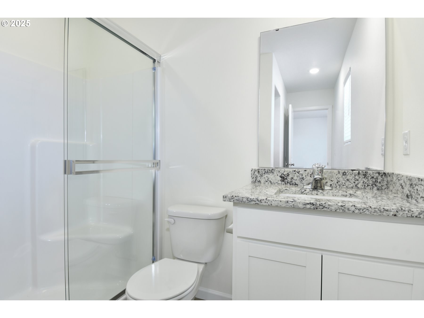 3915 Southwest Duniway Lane Gresham, OR 97080 - Photo 16 of 20 a bathroom with a sink and a mirror