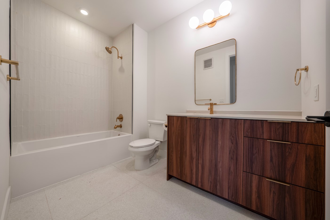 1701 Simond Avenue, Unit 212 Austin, TX 78723 - Photo 14 of 28 Bathroom featuring shower / washtub combination, vanity, and recessed lighting