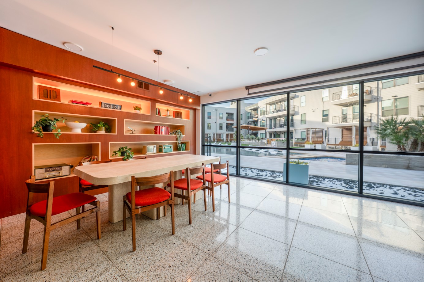 1701 Simond Avenue, Unit 212 Austin, TX 78723 - Photo 19 of 28 Dining space with dark speckled floor, floor to ceiling windows, and built in features