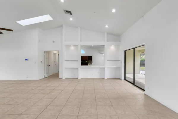 a view of an empty room and window