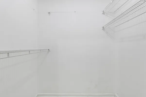 a view of small space with racks on the wall