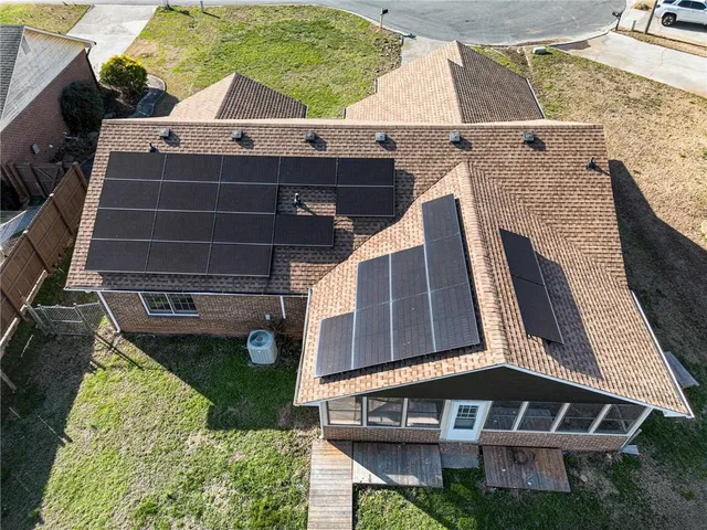 a front view of house with a yard