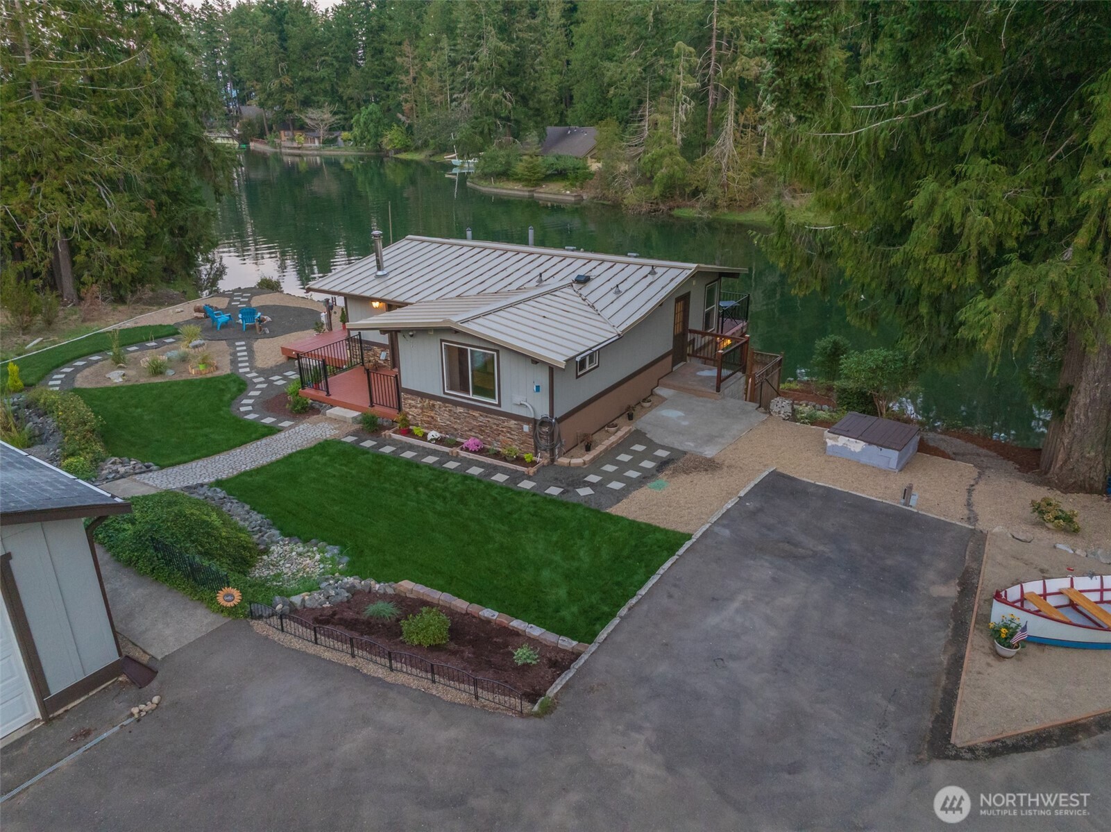 5440 East Grapeview Loop Road Allyn, WA 98524 - Photo 27 of 32 a view of a patio in backyard