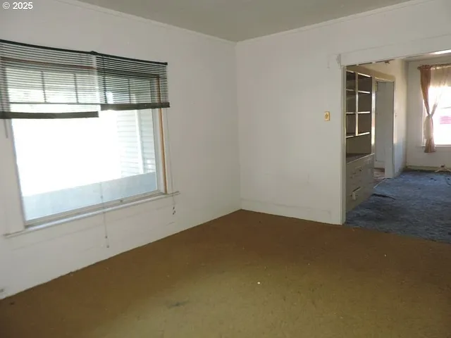 an empty room with a window