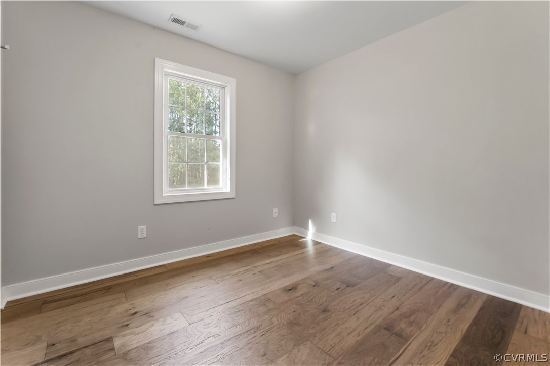 716 Harryhogan Road Callao, VA 22435 - Photo 12 of 21 #1 Bedroom with Wood floors & new paint.