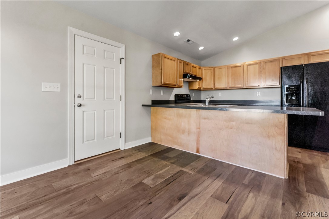 716 Harryhogan Road Callao, VA 22435 - Photo 7 of 21 Kitchen area & door to Garage.