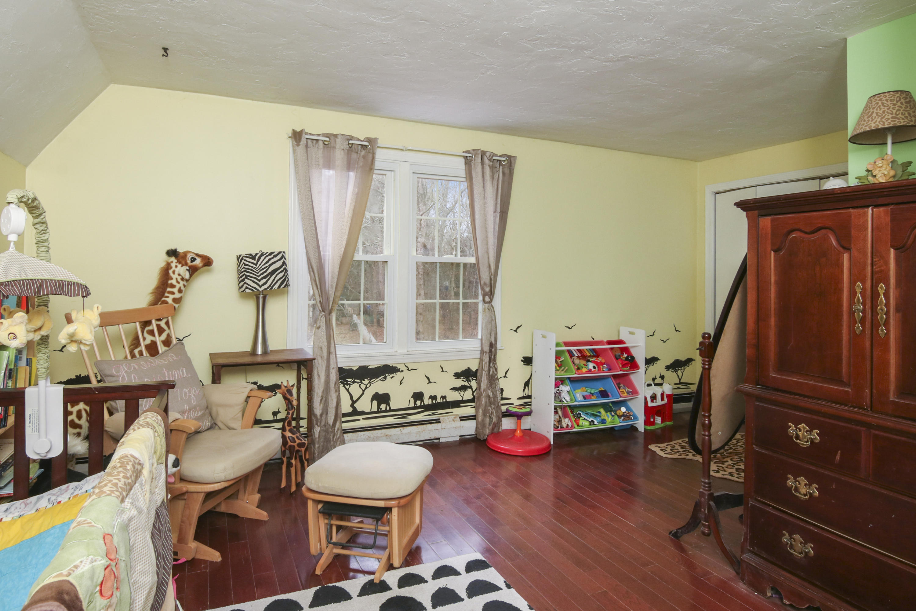 45 Blackthorn Path Forestdale, MA 02644 - Photo 12 of 19 a room with furniture a rug and a window