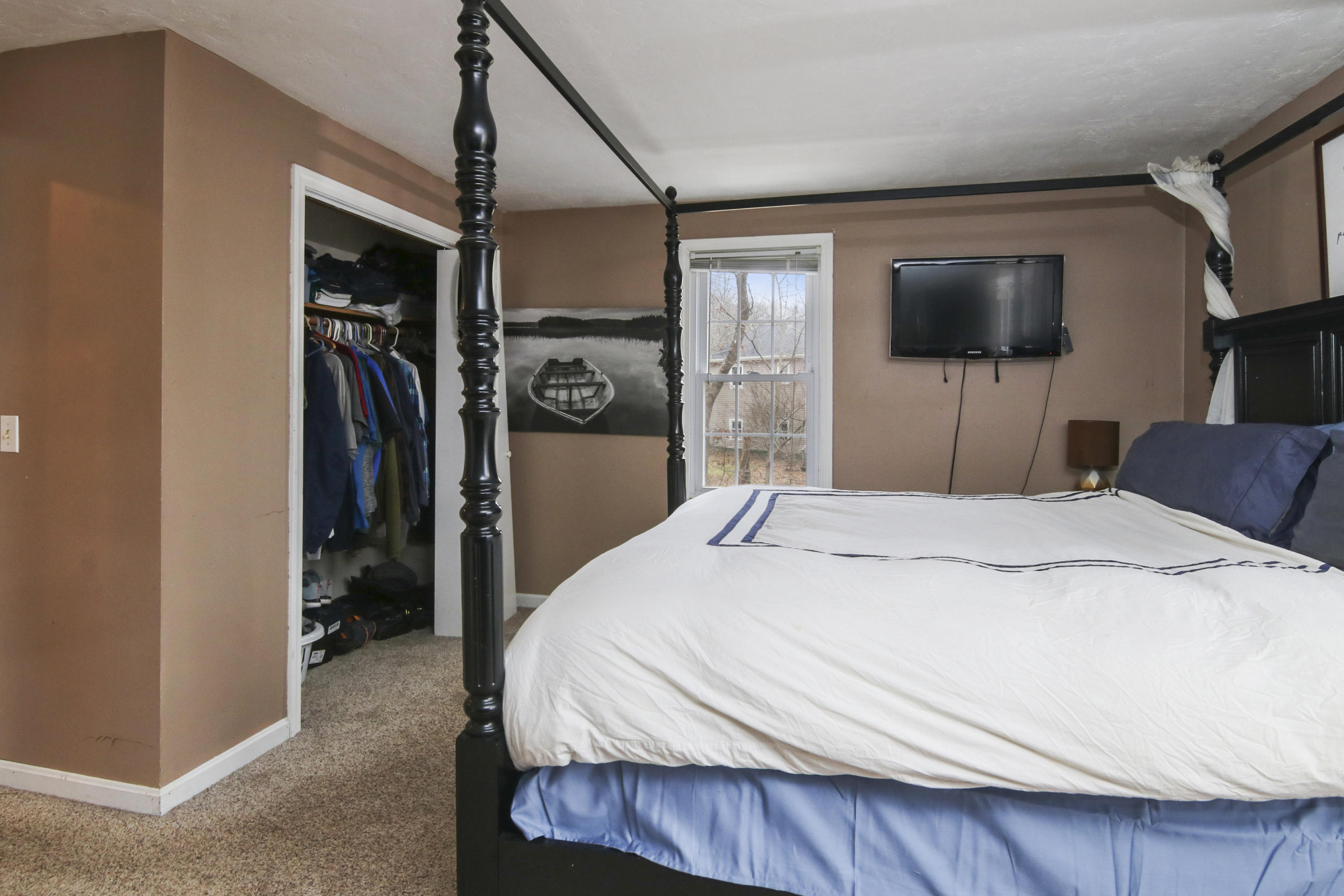 45 Blackthorn Path Forestdale, MA 02644 - Photo 16 of 19 a bedroom with a bed and a flat screen tv