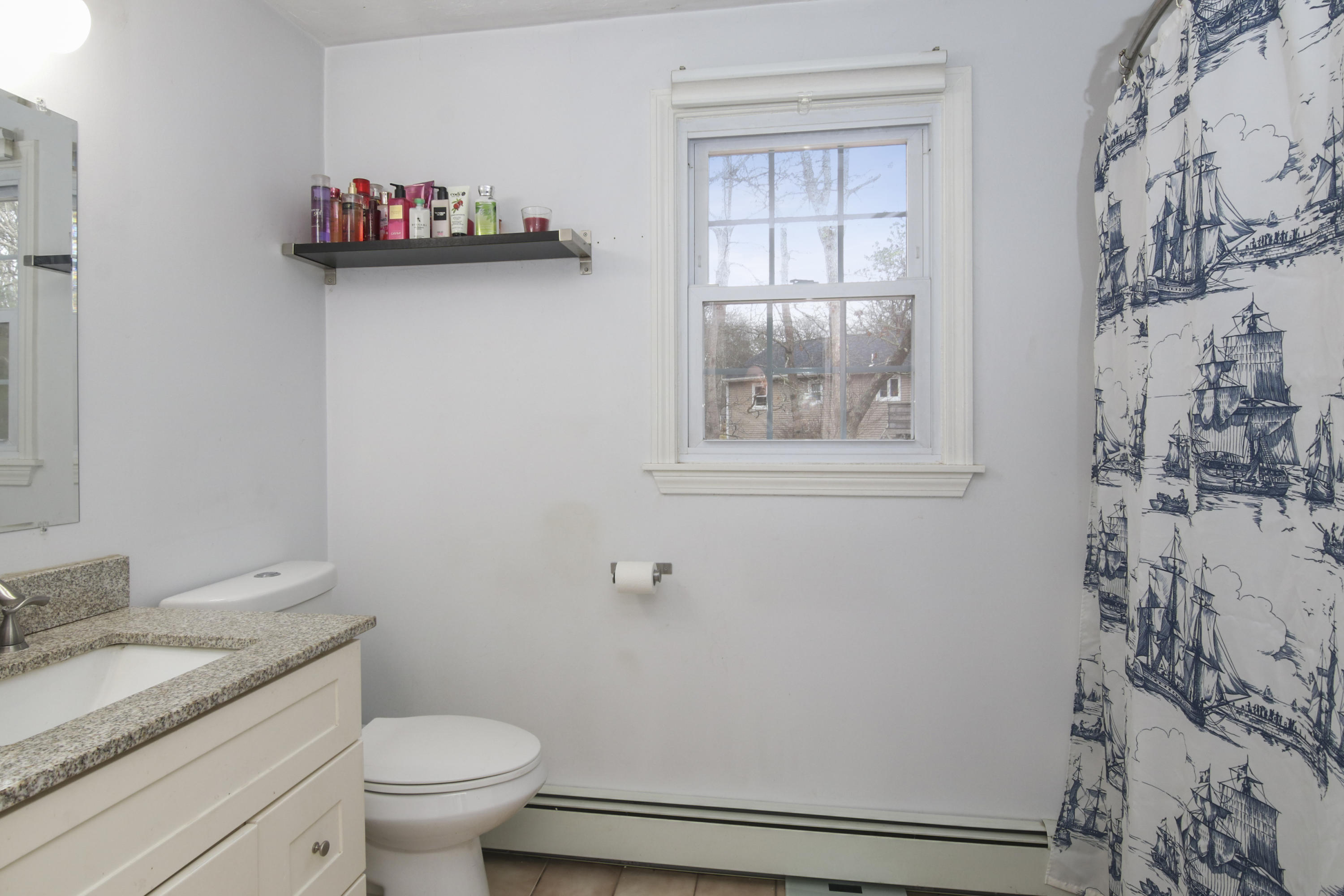 45 Blackthorn Path Forestdale, MA 02644 - Photo 17 of 19 a bathroom with a granite countertop toilet and sink