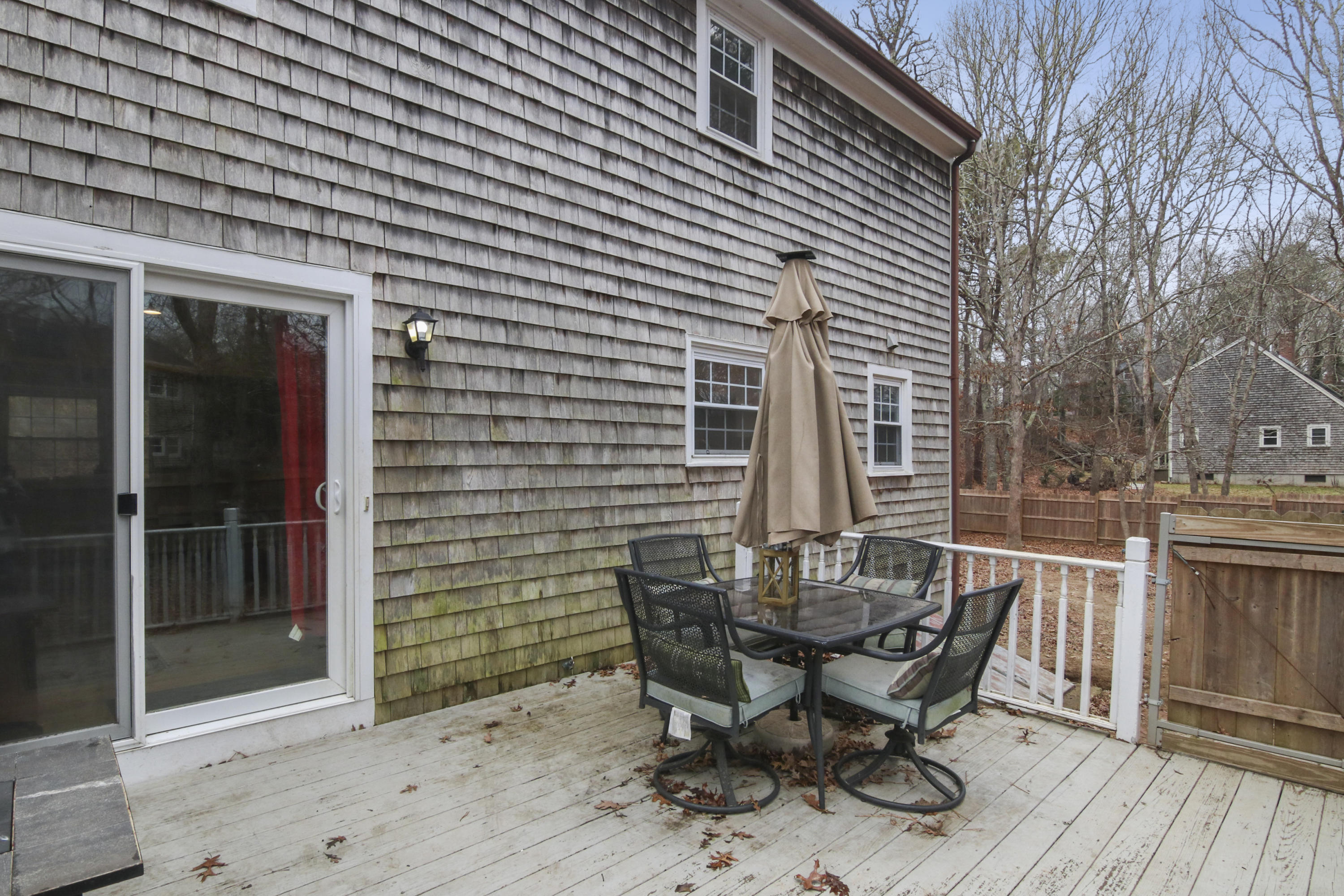 45 Blackthorn Path Forestdale, MA 02644 - Photo 19 of 19 a view of a patio with table and chairs and potted plants