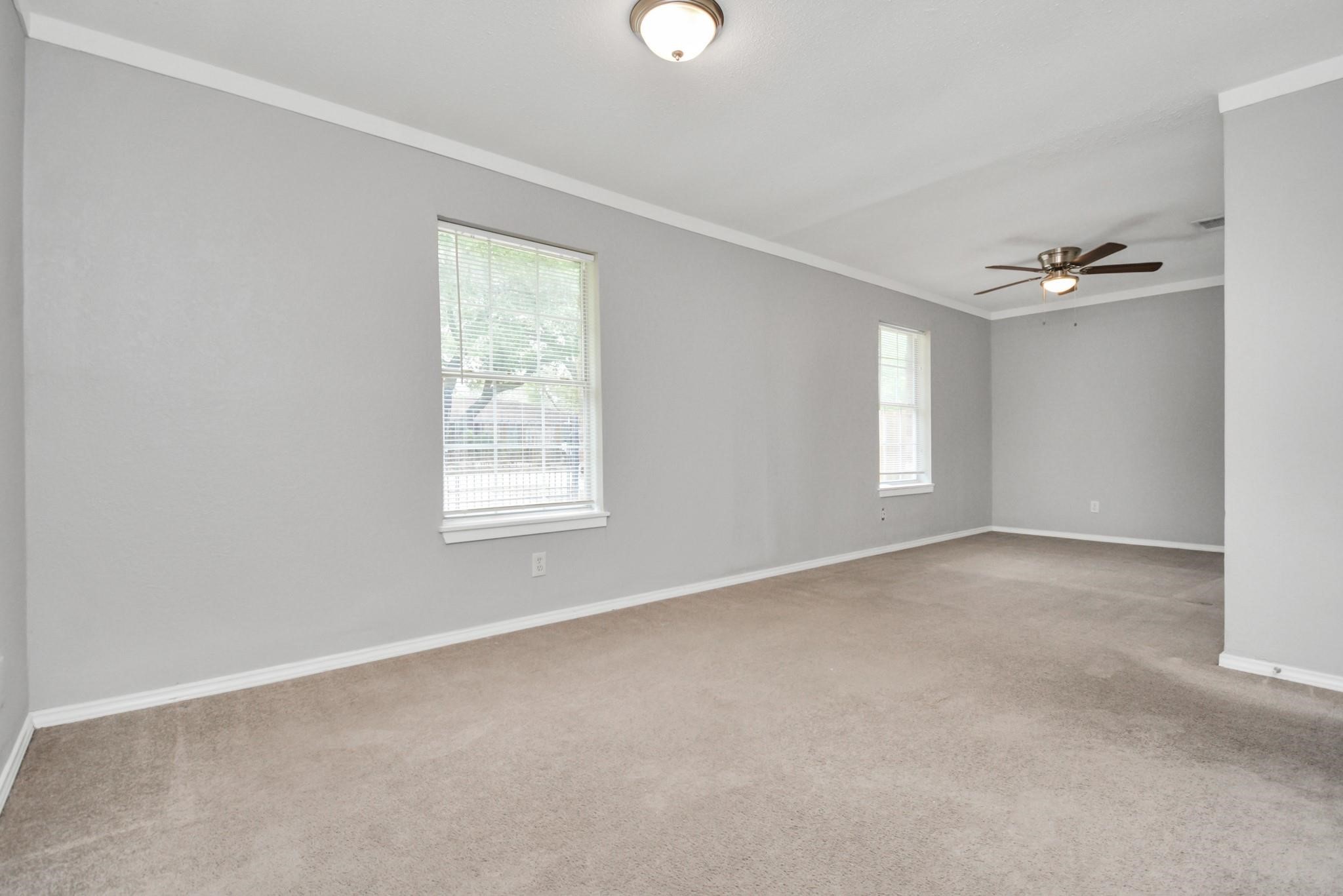 8622 Elbert Street, Unit B Houston, TX 77028 - Photo 9 of 21 a view of an empty room with a window