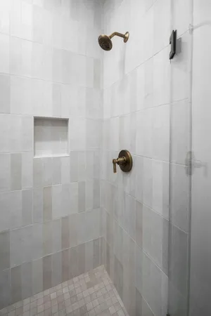 a close view of a bathroom shower