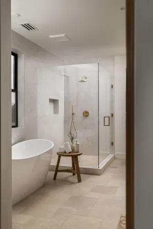 a bathroom with a toilet tub shower and mirror