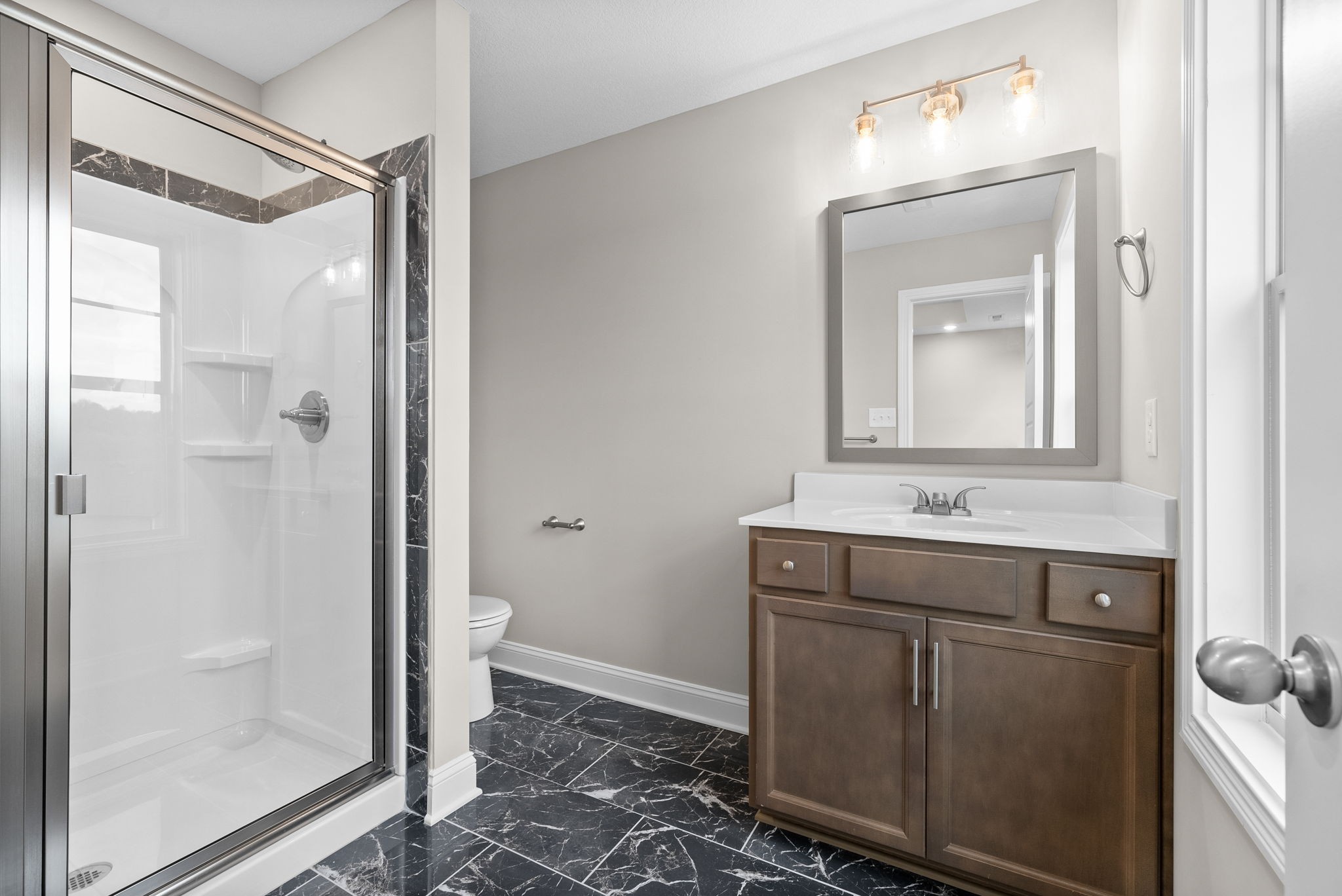 4 Echo Ridge Oak Grove, KY 42262 - Photo 15 of 29 a bathroom with a granite countertop sink mirror and a toilet