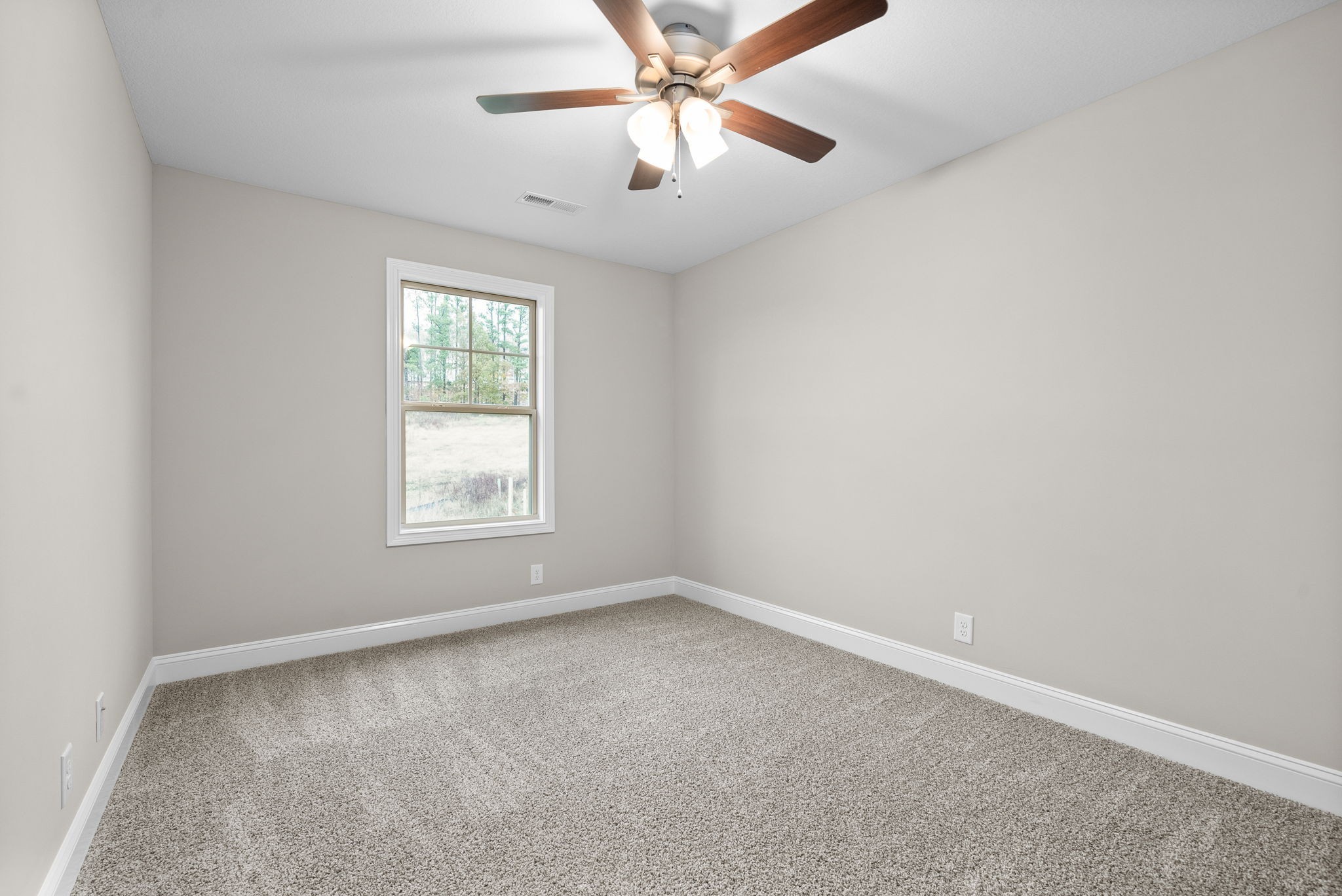 4 Echo Ridge Oak Grove, KY 42262 - Photo 18 of 29 an empty room with a window and a fan
