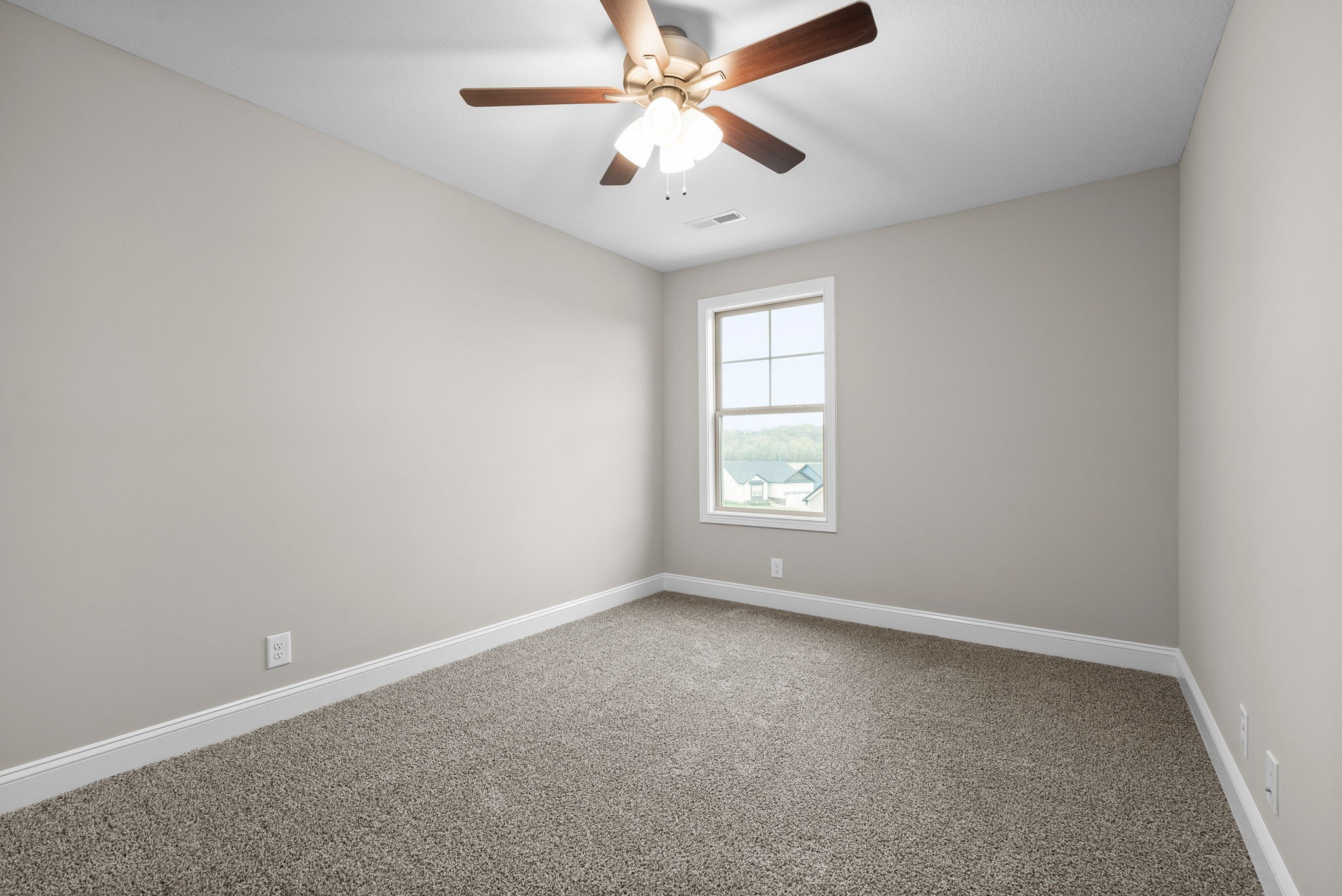 4 Echo Ridge Oak Grove, KY 42262 - Photo 21 of 29 an empty room with a window and a fan