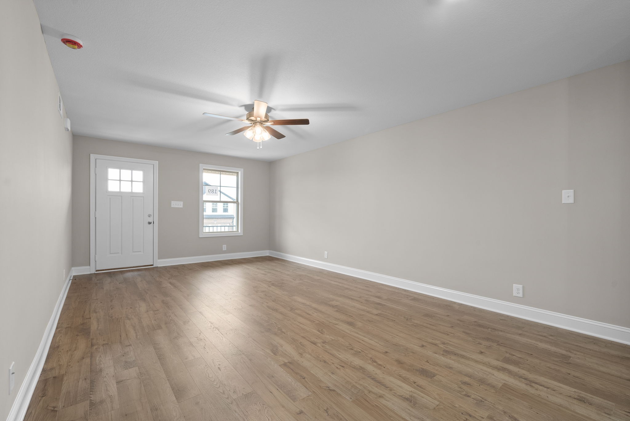 4 Echo Ridge Oak Grove, KY 42262 - Photo 5 of 29 wooden floor in an empty room with a window