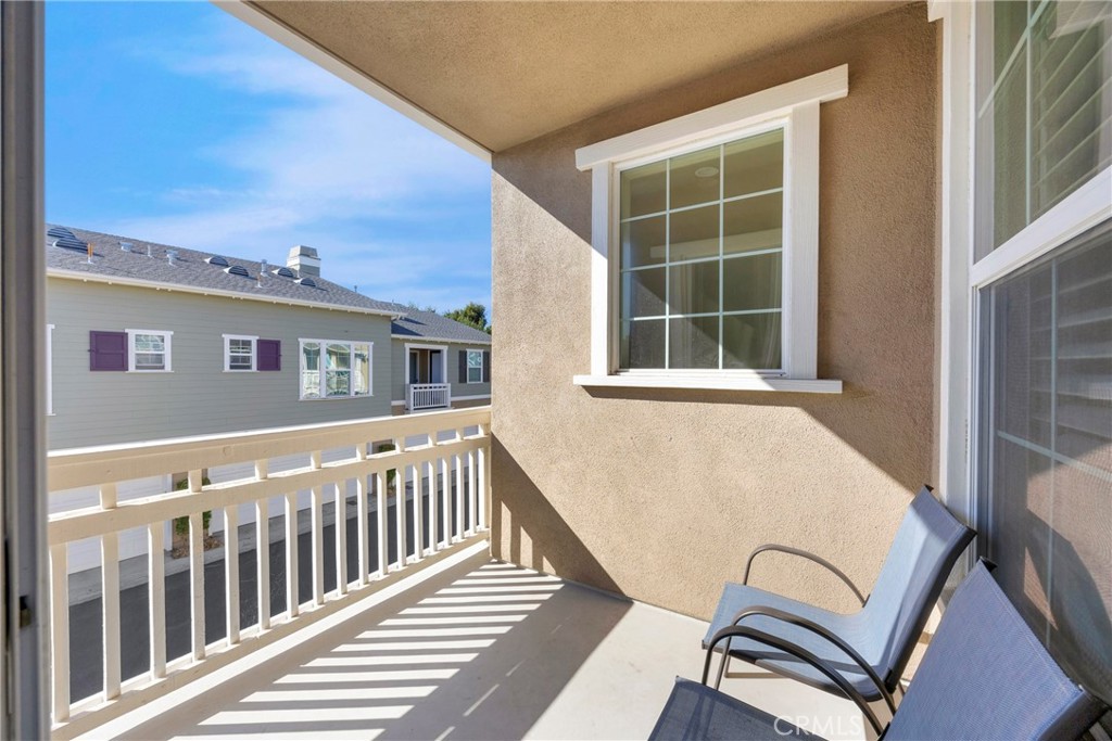 10 Agave Court Ladera Ranch, CA 92694 - Photo 15 of 36 a view of a chair and tables in the balcony