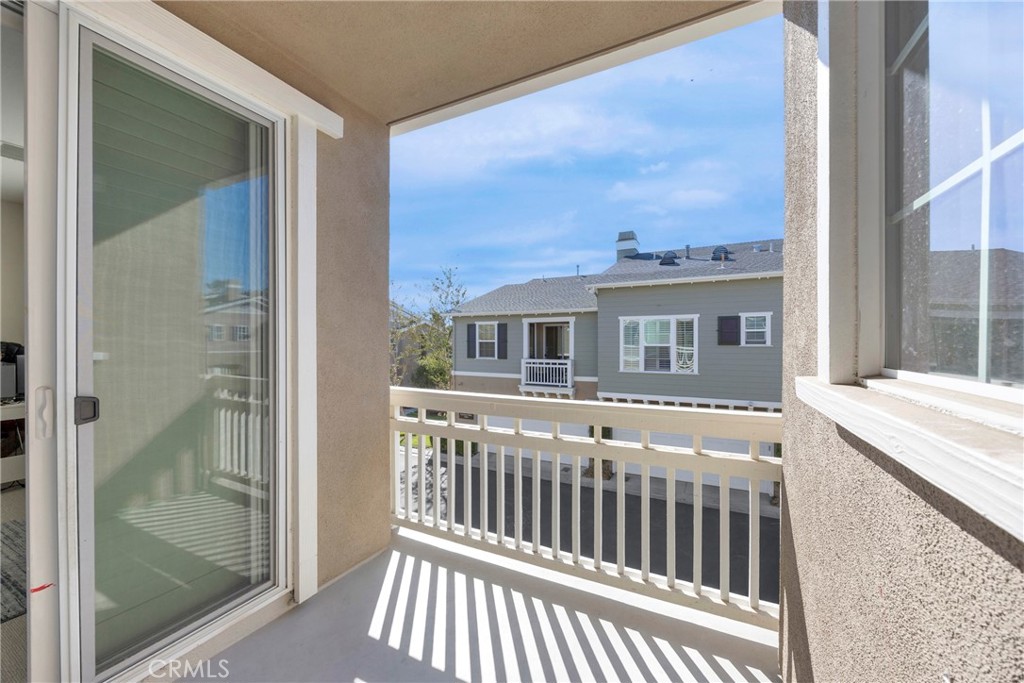 10 Agave Court Ladera Ranch, CA 92694 - Photo 16 of 36 a view of a balcony with wooden floor