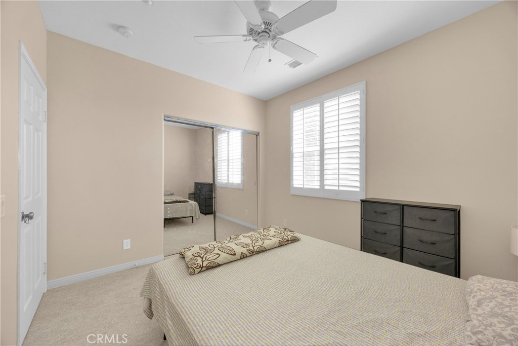 10 Agave Court Ladera Ranch, CA 92694 - Photo 18 of 36 a bedroom with a bed and a dresser